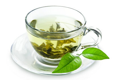 cup-with-green-tea-and-green-leaves