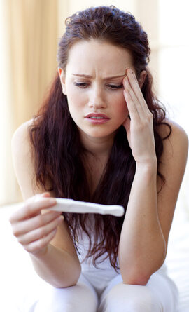 woman-looking-at-a-pregnancy-test