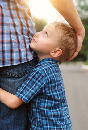 son-hugging-his-father